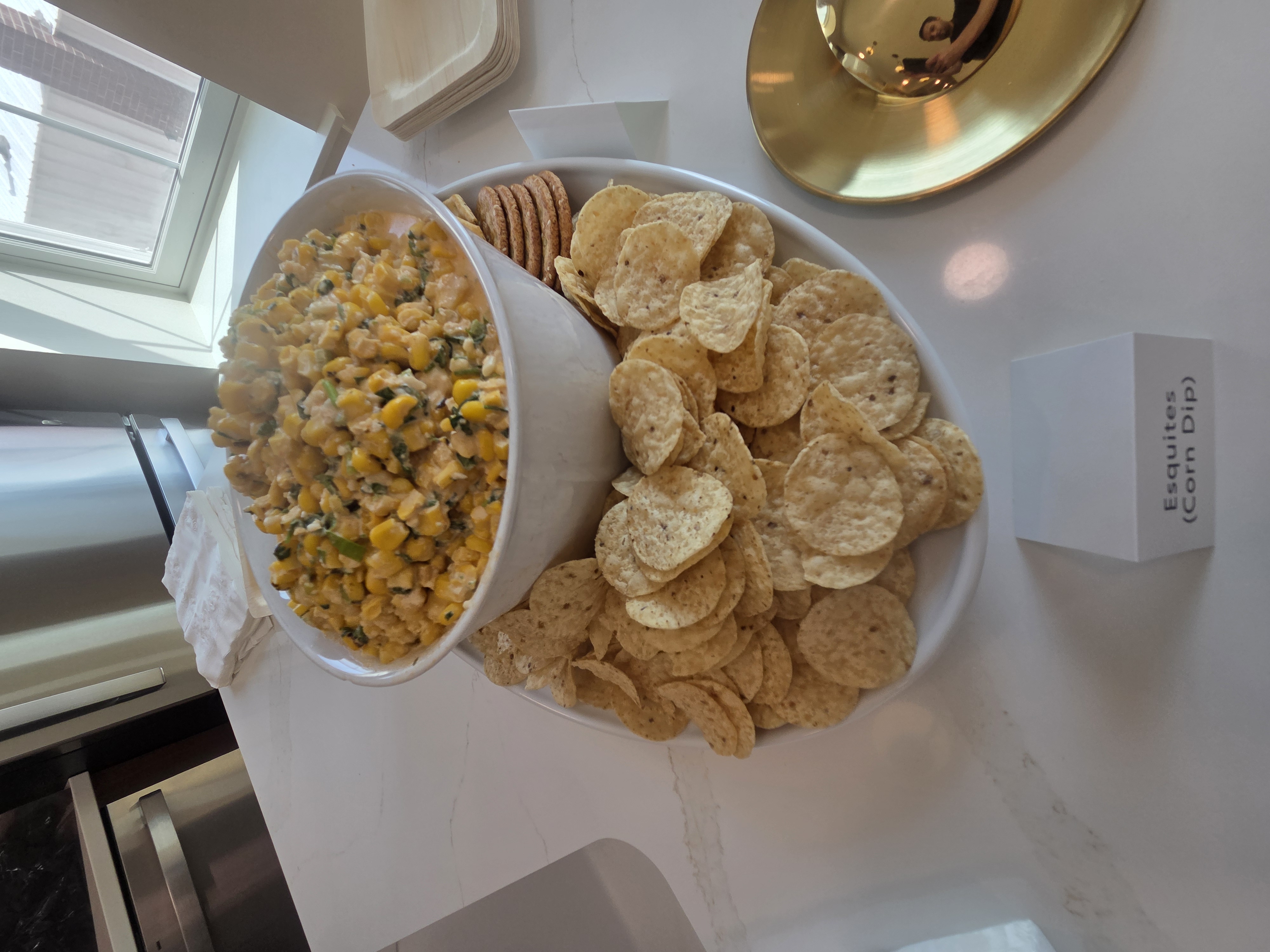 Esquites corn dip, served with chips and crackers.