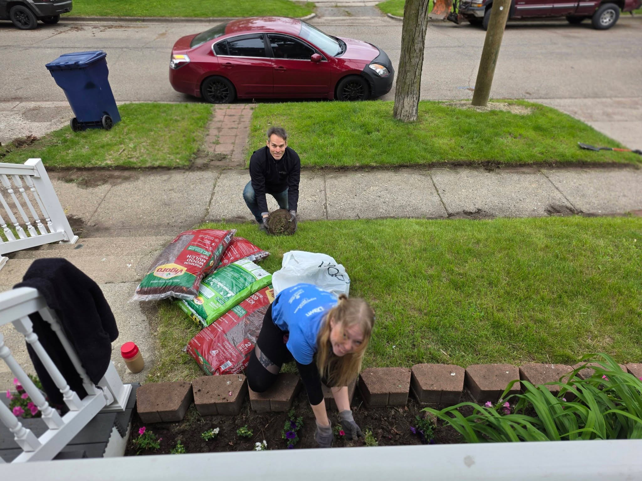 Volunteers planting and tending the front garden