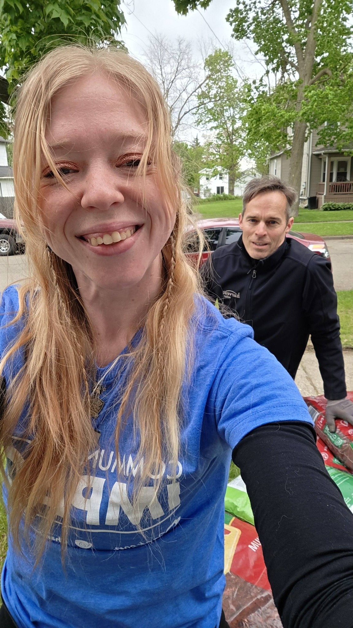 Kay and a fellow volunteer at the project
